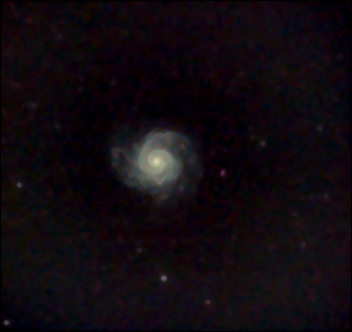  What is shown in this picture is the Phantom galaxy but since it is such a far
away galaxy, and very, very dim, it is extremely hard to get a clear photo so this is as good as I could get.