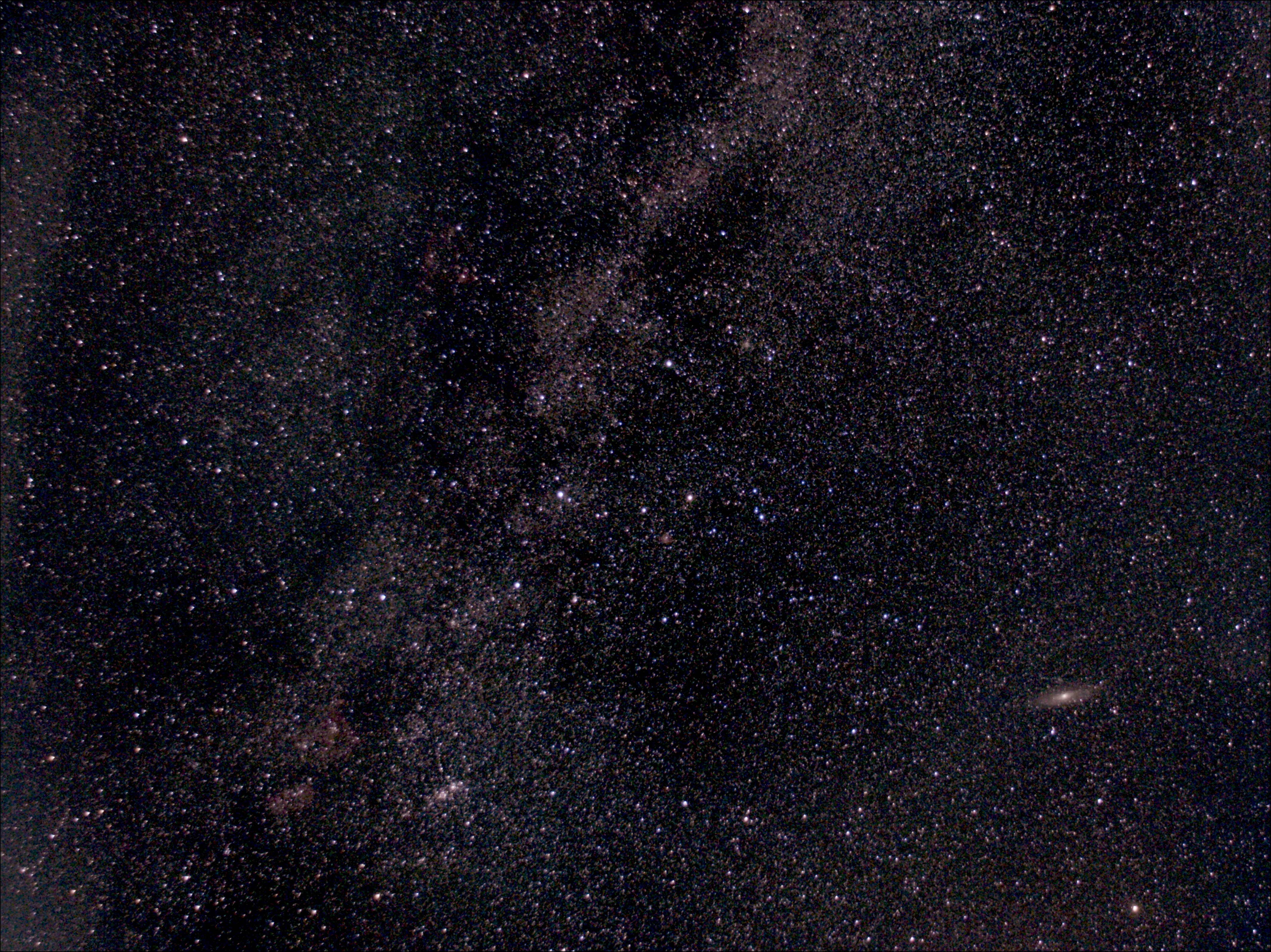 In the center of this image, one will see the Cassiopeia constellation. It is seen as a W rotated roughly 45 degrees to
the left. Near the bottom right, one will also see the Andromeda galaxy.