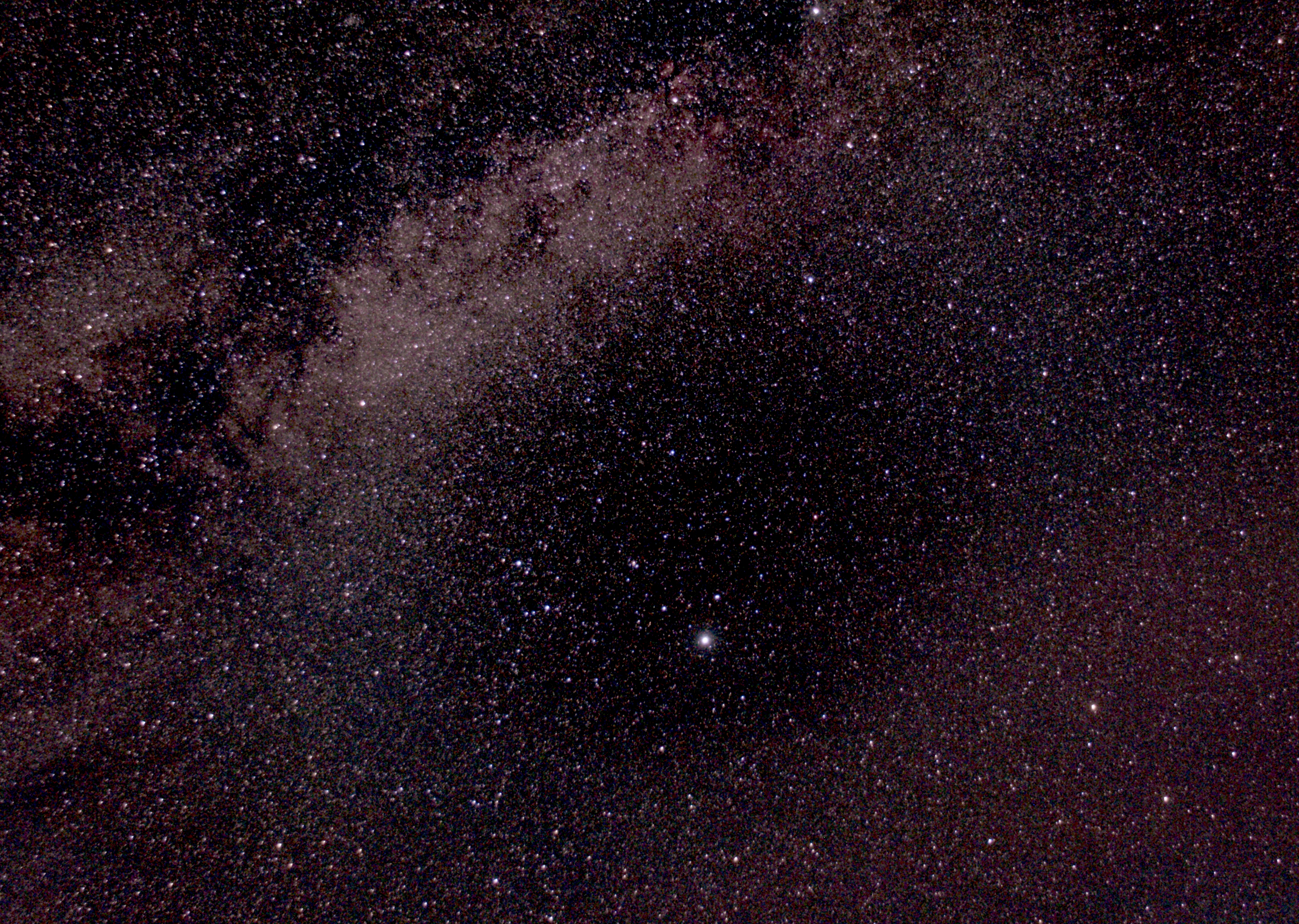 The brightest star in this image is
Deneb. In the top left, the image is cut across by the Milky Way. Many deep sky objects, such as the North American Nebula, are near this star and may have been captured as well